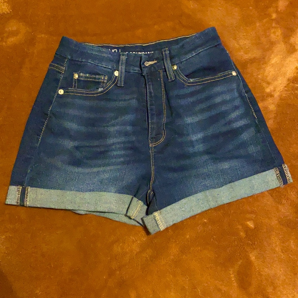 Dark blue denim short shorts. Size 7. Stretch denim.